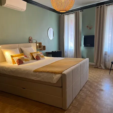Au Cheval Blanc - Climatisees Hotel